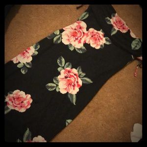 Black floral off the shoulder dress.